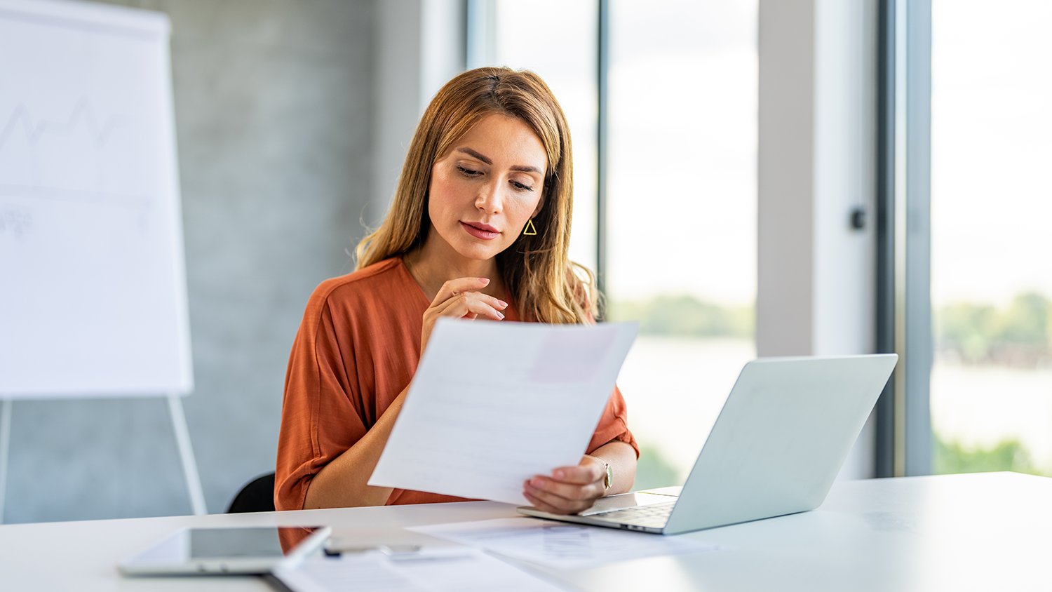 Woman looking at her credit report.